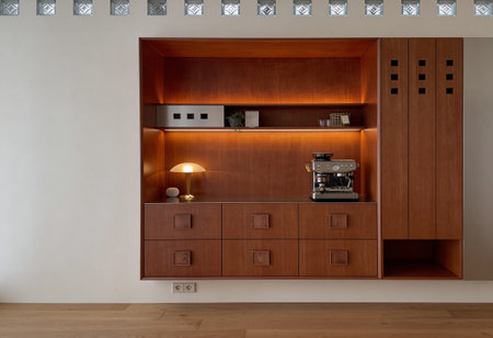 Interior of a modern kitchen with a cupboard and a coffee machineの写真素材