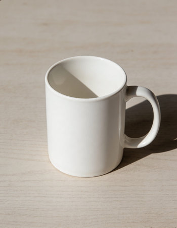 Coffee cup on wooden table, vintage style, selective focusの写真素材
