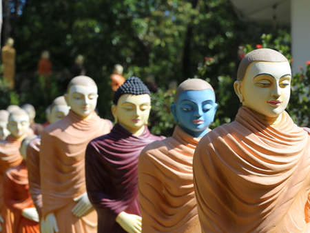 Buddhist monk statues going to Buddha temple, Ambalangoda, Sri Lankaの写真素材
