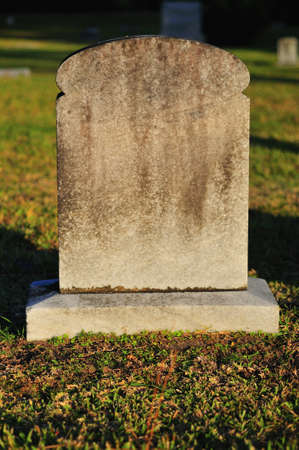 Blank Tombstone in a cemetery ready for textの写真素材