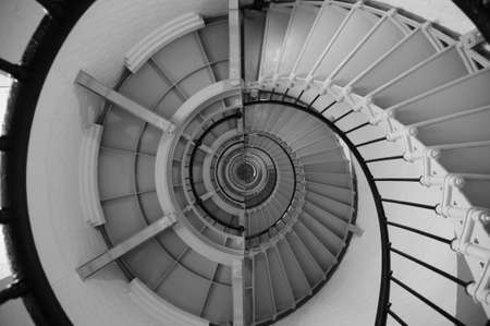 Abstract photo of a spiral staircase inside a lighthouseの写真素材