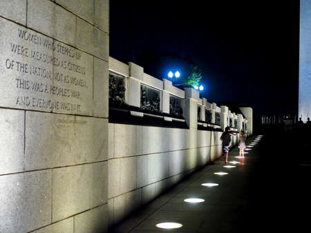 Washington, DC USA. Aug 2017. Kids playing at night enjoying the freedom that at which this World War II Memorial proudly stands for.のeditorial素材