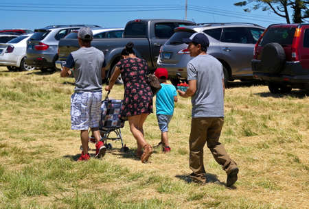 Middlefield, CT USA. Jun 2019. Hispanic family happily heading home with their delicious...