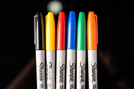 Kuala Lumpur, Malaysia - December 2019. âSHARPIEâ permanent marker pen isolated against blackのeditorial素材