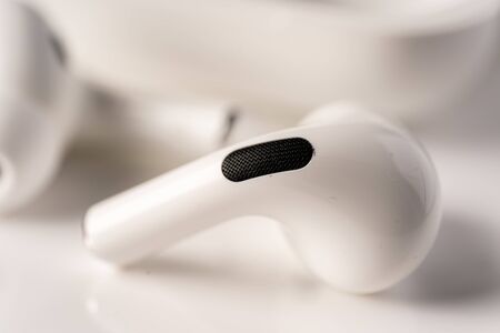 Kuala Lumpur, Malaysia - December 2019. Apple Airpods Pro isolated against black. The new airpods pro features active noise cancelling and  customizable fitのeditorial素材