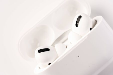 Kuala Lumpur, Malaysia - December 2019. Apple Airpods Pro isolated against black. The new airpods pro features active noise cancelling and  customizable fitのeditorial素材
