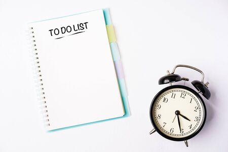 TO DO LIST wordings on a notebook on a table, flat lay composition, copy space for textの写真素材