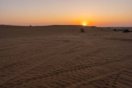 Sunset in Dubai Desertの写真素材