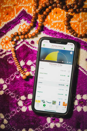 Digital Quran or Quran apps is used for muslim to read the text of Quran on an electronic device. Islamic flatlay conceptのeditorial素材