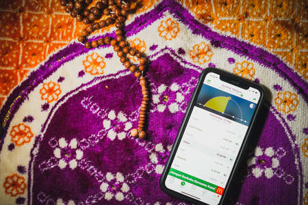 Digital Quran or Quran apps is used for muslim to read the text of Quran on an electronic device. Islamic flatlay conceptのeditorial素材