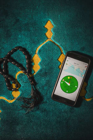 Digital Quran or Quran apps is used for muslim to read the text of Quran on an electronic device. Islamic flatlay conceptのeditorial素材