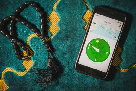 Digital Quran or Quran apps is used for muslim to read the text of Quran on an electronic device. Islamic flatlay conceptのeditorial素材