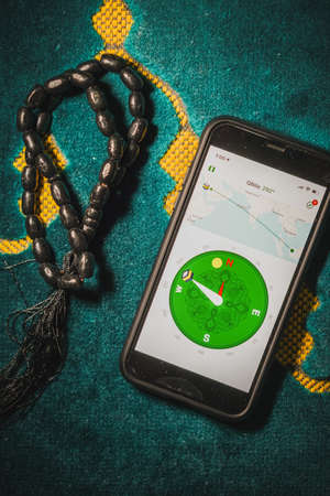 Digital Quran or Quran apps is used for muslim to read the text of Quran on an electronic device. Islamic flatlay conceptのeditorial素材