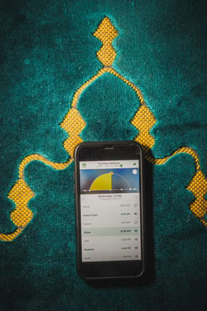 Digital Quran or Quran apps is used for muslim to read the text of Quran on an electronic device. Islamic flatlay conceptのeditorial素材