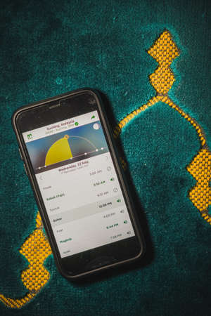 Digital Quran or Quran apps is used for muslim to read the text of Quran on an electronic device. Islamic flatlay conceptのeditorial素材