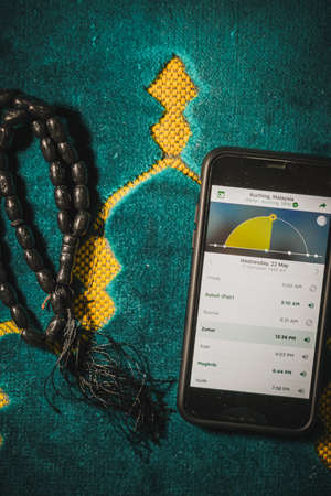 Digital Quran or Quran apps is used for muslim to read the text of Quran on an electronic device. Islamic flatlay conceptのeditorial素材