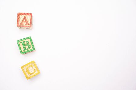 ABC blocks arranged in stack, education and kids backgroundの写真素材