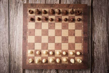 Wooden chest set on wooden background, copy space for text. strategy concept