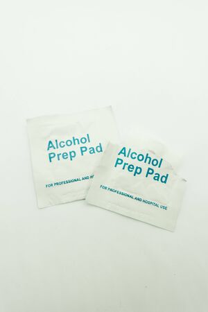alcohol swab, isolated, used to sterilized skin area prior to injection or blood taking proceduresの写真素材