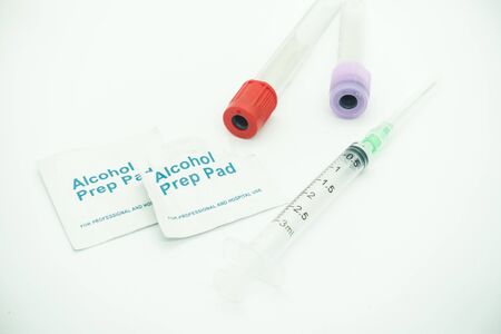 blood taking kit, empty syringe with needle, blood collection tube and alcohol swab, medical conceptの写真素材
