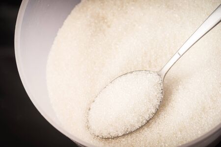 Diabetes Concept: Diabetes wordings on top of sugar heaps. November is World Diabetes Month