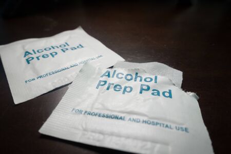 alcohol swab, isolated, used to sterilized skin area prior to injection or blood taking proceduresの写真素材