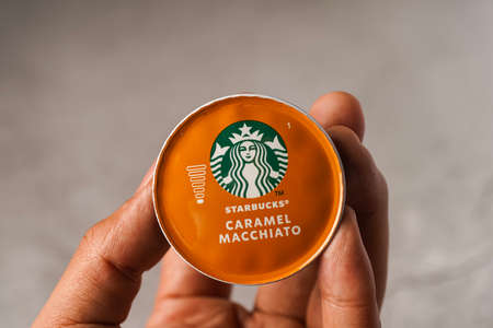 Illustrative editorial shot of Starbucks Caramel Macchiato coffee capsulesのeditorial素材