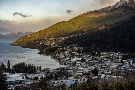 Scenic view of Queenstown, New Zealand during sunsetの写真素材