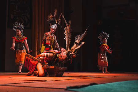 A Sarawakian Traditional dance by Sarawakian people in Sarawak Cultural Villageのeditorial素材