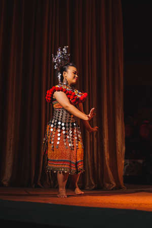 A Sarawakian Traditional dance by Sarawakian people in Sarawak Cultural Villageのeditorial素材