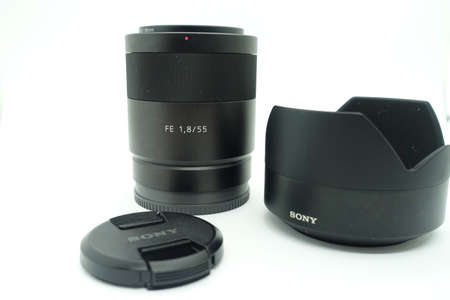 A zeiss 55mm f/1.8 lens against isolated white background. This lens is hugely popular due to its...