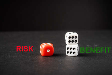 Red and White dices, Risk vs Reward conceptual shot.の写真素材