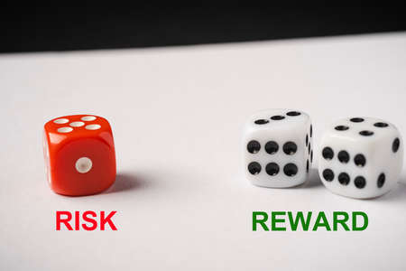 Red and White dices, Risk vs Reward conceptual shot.の写真素材