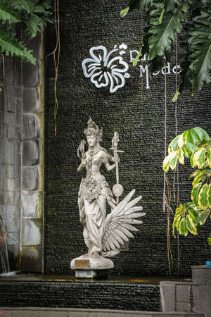 The stone statue in front of Rumah Mode, Bandung, a famous factory outlet store in Bandungのeditorial素材