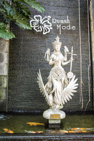 The stone statue in front of Rumah Mode, Bandung, a famous factory outlet store in Bandungのeditorial素材