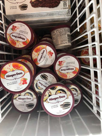 Variety of of Haagen Dazs icecream inside a chillerのeditorial素材