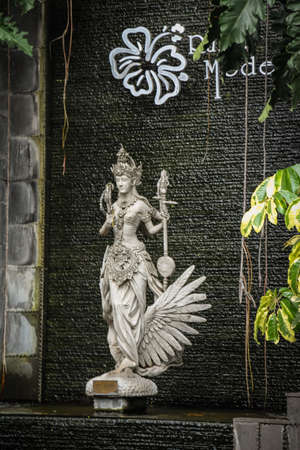 The stone statue in front of Rumah Mode, Bandung, a famous factory outlet store in Bandungのeditorial素材