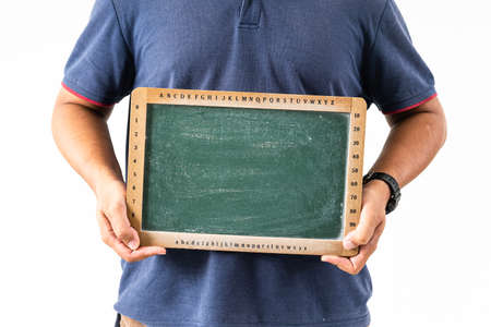 An unidentified man holding a black chalk board, copyspaceの写真素材