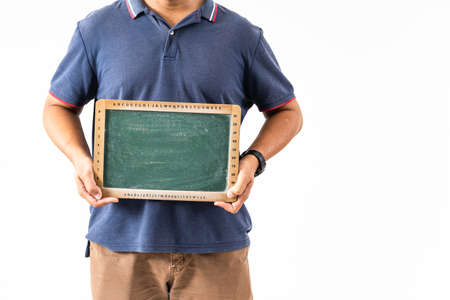 An unidentified man holding a black chalk board, copyspaceの写真素材