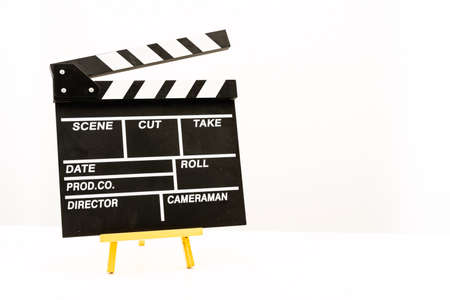Clapperboard isolated against white backgroundの写真素材