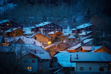 The beautiful mountain cottages in Thollon Les Memises, France in Winterのeditorial素材