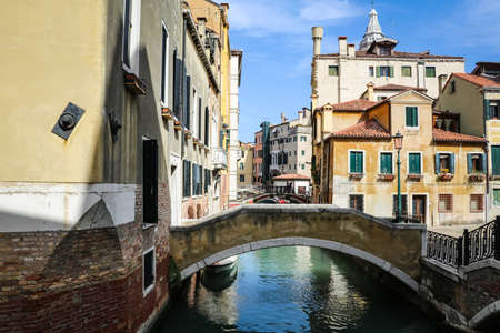 first person view of riding a gondola in the beautiful Grand Canal, Venice, Italyの写真素材