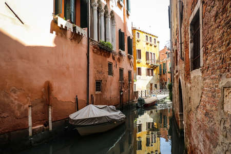 first person view of riding a gondola in the beautiful Grand Canal, Venice, Italyの写真素材