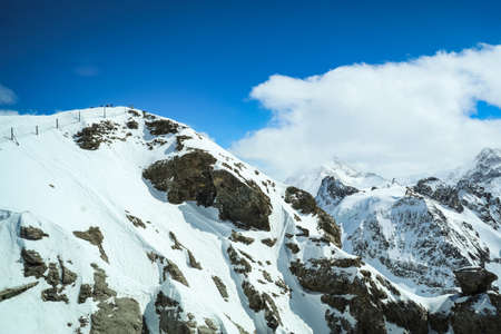 The snowy mountains at Mount Titlis, Switzerlandの写真素材