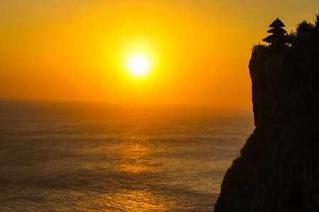 Sunset at Uluwatu Temple at Uluwatu Beach, Baliの写真素材