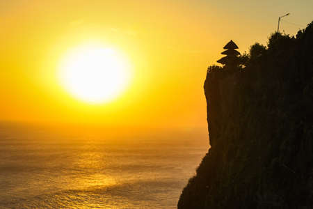 Sunset at Uluwatu Temple at Uluwatu Beach, Baliの写真素材
