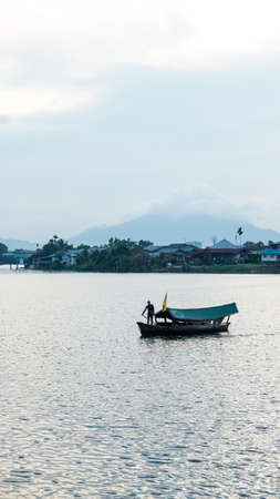 Sarawak River Cruise boat cruising along Sarawak River in Kuching Waterfrontのeditorial素材