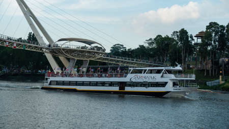 Sarawak River Cruise boat cruising along Sarawak River in Kuching Waterfrontのeditorial素材