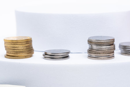 Savings concept. Coins on white backgroundの写真素材