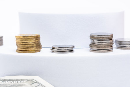 Savings concept. Coins on white backgroundの写真素材